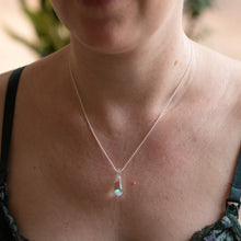 Load image into Gallery viewer, Woman wearing glass opal pendant with sterling silver chain
